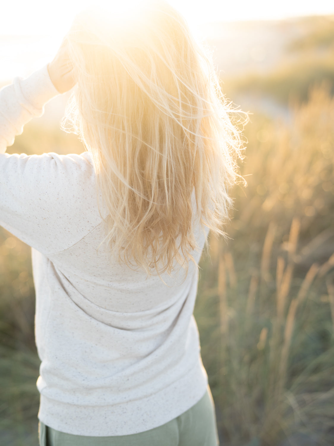Fair Fashion Frauen Sweater aus 100% Biobaumwolle mit feinen, bunten highlights von FUXBAU in GOTS zertifizierter Biobaumwolle.