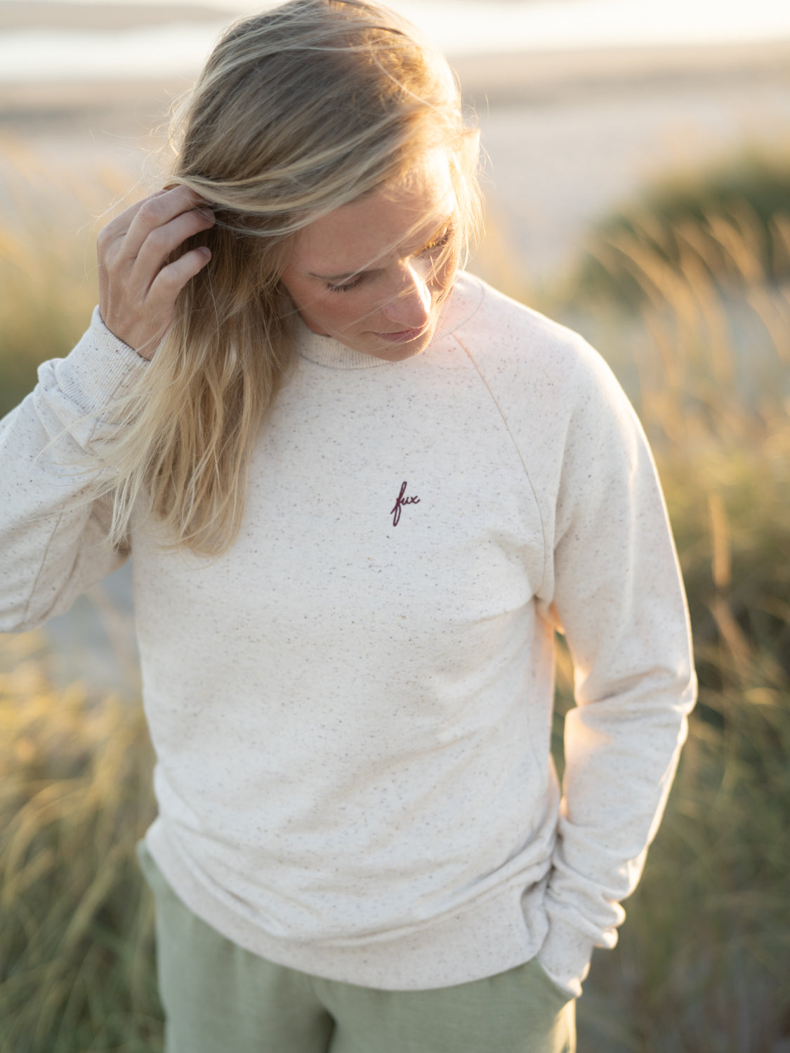 Fair Fashion Frauen Sweater aus 100% Biobaumwolle mit feinen, bunten highlights von FUXBAU in GOTS zertifizierter Biobaumwolle.
