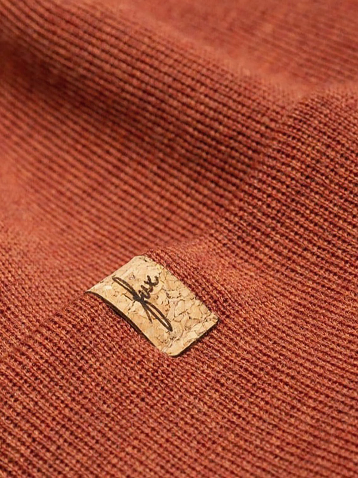 fux Kork Patch unserer Merino Kork Beanie in herbstorange aus 100% Merinowolle